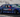 Adam LZ's E36 drift car smoking out the car behind him in Formula Drift