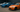 Tokyo Drift cars lined up showcasing their unique designs and modifications