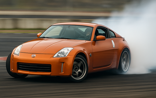 Nissan 350Z drifting with angle kit installed and wide steering angle