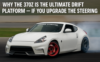 Nissan 370Z with wide angle drift kit initiating a high-speed corner at a drift event