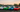 A lineup of the best drift cars for 2026 on a racetrack.