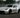 Nissan 370Z drifting on a track.