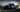 Pickup truck mid-drift with high steering angle and modified front suspension setup