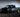 A pickup truck drifting on a race track