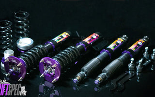 SLR drift spec coilovers installed on a competition drift car with high steering angle and rear squat setup