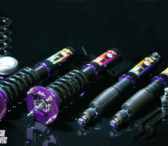 SLR drift spec coilovers installed on a competition drift car with high steering angle and rear squat setup
