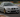 BMW E46 cornering hard on a racetrack with upgraded coilovers installed