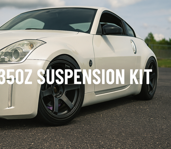 Nissan 350Z with aftermarket suspension kit installed, showcasing aggressive stance and camber settings.