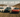 A 370Z, E36, and RX7 FD drifting side by side in Arizona
