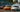 An E36, 350Z, and GT86 drifting side by side in Florida at drift event