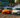 An E36, 350Z, and GT86 drifting side by side in Florida at drift event