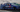 Adam LZ's E36 drift car smoking out the car behind him in Formula Drift