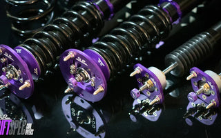 E36 coilovers close up purple camber plates