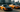 Iconic cars from Tokyo Drift, including the Veilside RX-7 and 350Z.