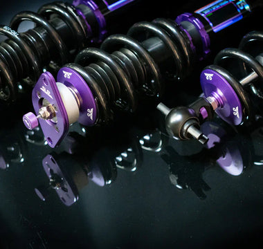 C5 Corvette Coilovers close up on a table full set