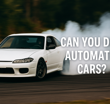 an automatic s15 nissan silvia drifting on a drift track