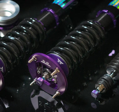 Side-by-side coilover and lowering spring comparison shot