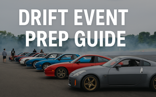 Cars lined up in grid at a drift event with drivers and tire smoke in background
