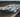 A drone view of a large drift event in Florida, 5 drift cars seen sliding with thousands of people in the crowd