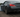 Drift car rear view with worn tires and suspension components visible after a drift session