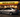 Lowered BMW E46 coupe with super concave wheels parked in front of a Waffle House at night under bright restaurant lights