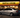 Lowered BMW E46 coupe with super concave wheels parked in front of a Waffle House at night under bright restaurant lights