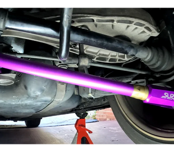 purple anodized BMW E46 control arms