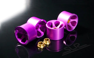 close-up of purple anodized E46 bushings