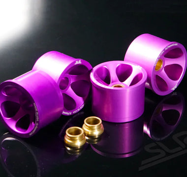 close-up of purple anodized E46 bushings