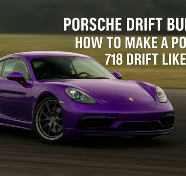 Porsche 718 Cayman mid-drift on track with aggressive camber and front lock