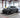 garage setup with car on low ramps