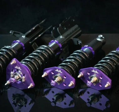 A full set of SN95 Coilovers with true coilover rear suspension