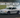 SN95 Mustang mid-drift with visible camber and rear squat, coilovers in action