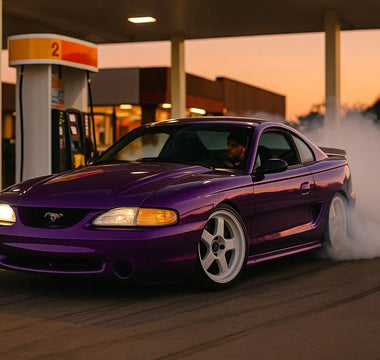 SN95 Mustang drift car drifting around a gas pump in Florida