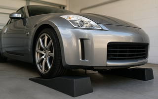 350Z with car ramps for oil change under it lifted up