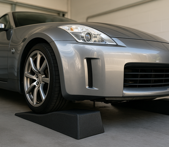 350Z with car ramps for oil change under it lifted up