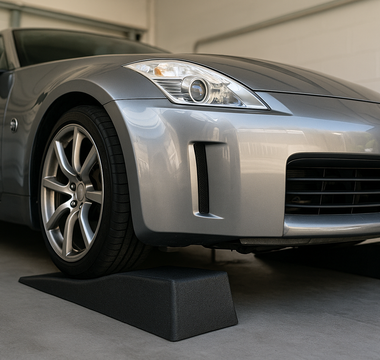 350Z with car ramps for oil change under it lifted up