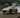 A 370Z coilovers set on a 370Z drifting and jumping on a track in Japan