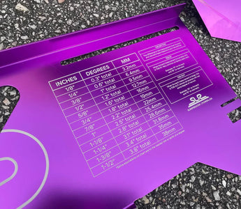 close up of toe in plates with conversion chart for accurate toe setting