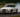 BMW E36 drift car at angle showing lowered coilover suspension and drift-tuned steering geometry