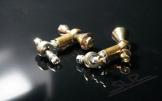 Close-up of sway bar links mounted on a car suspension system