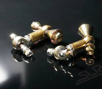 Close-up of sway bar links mounted on a car suspension system